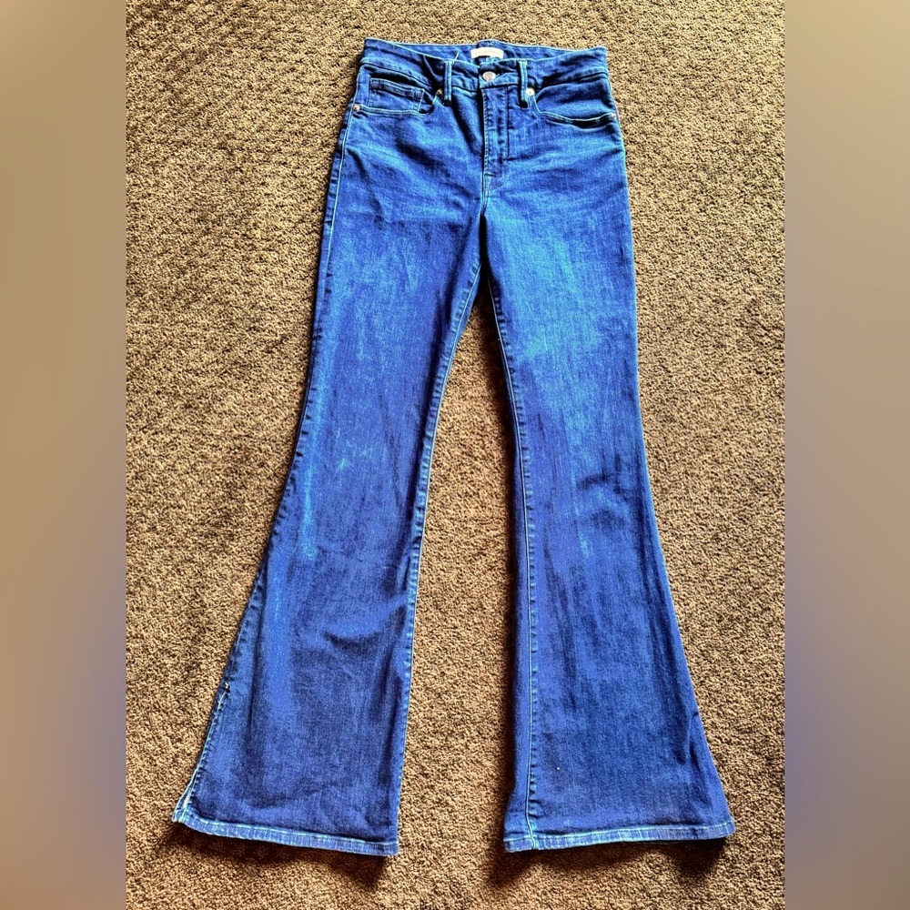Good American flare, split hem jeans.